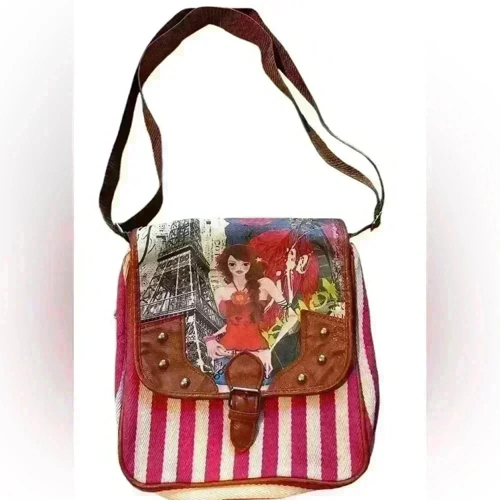 A red and white striped Paris themed messenger crossbody bag